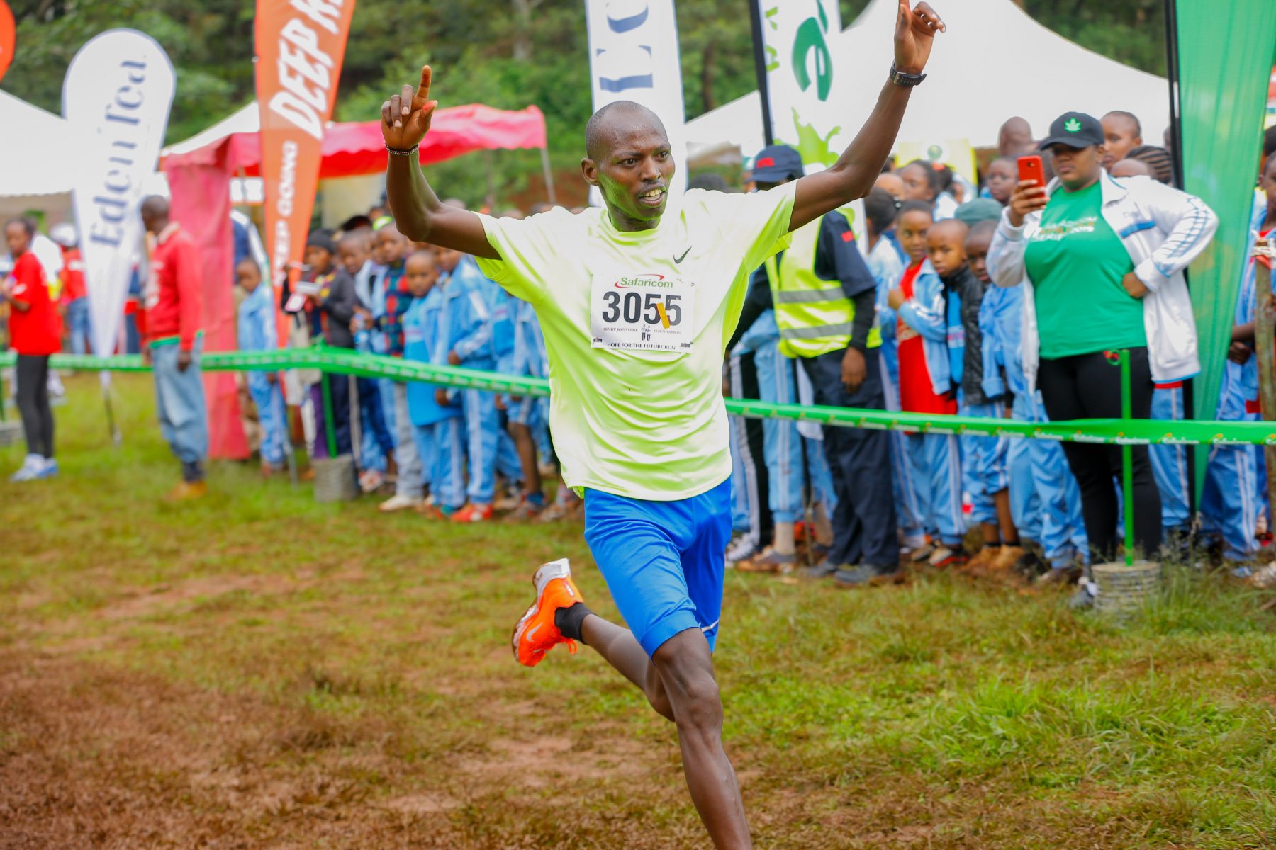 Michael Kunyuga crosses the finish line to win the men’s senior race during The Henry Wanyoike Hope for the future run at Alliance High School grounds in Kikuyu.