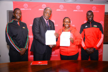 Charles Nyaberi, Kenya Volleyball Federation President (centre left), Priscilla Gathungu, Java House Group CEO (centre right), present the signed partnership documents flanked by Mercy Moim, Malkia Strikers Captain (left), and Brian Melly, Wafalme Stars Captain (right) on 5 March 2024